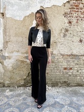 Jumpsuits met dots bovenaan