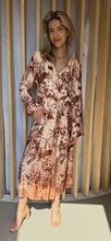 Lange jurk met lange mouw print