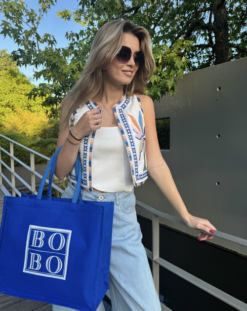 Open gilet met borduringen in kleur