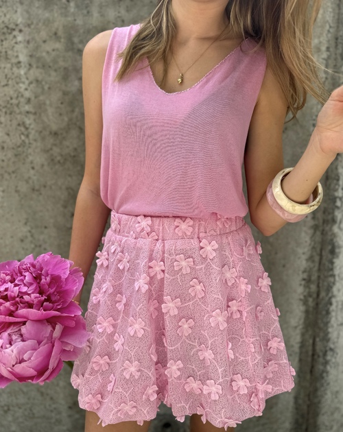 top met lurex aan arm