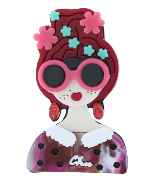 Broche dame met bril