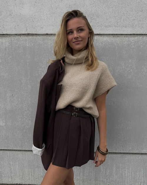 Gilet met knopen zonder mouwen